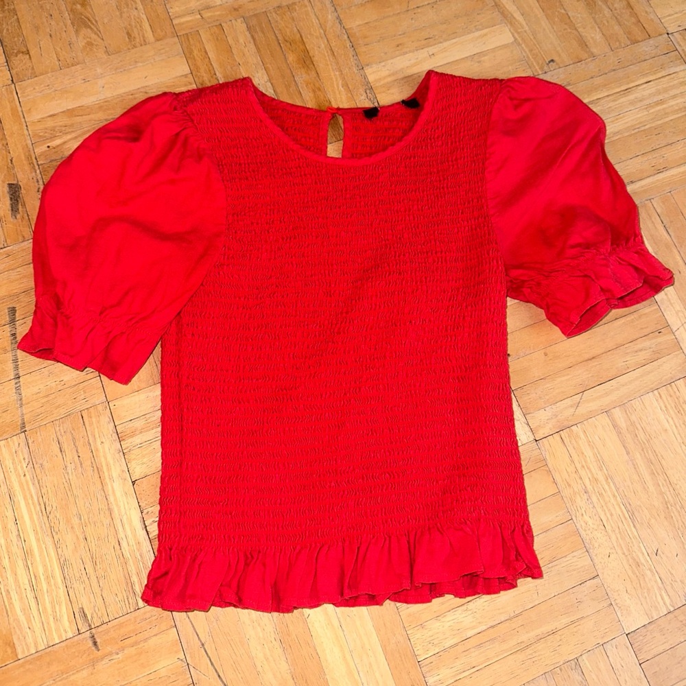 Small red crop top. Don’t know the brand so tagged free people for exposure